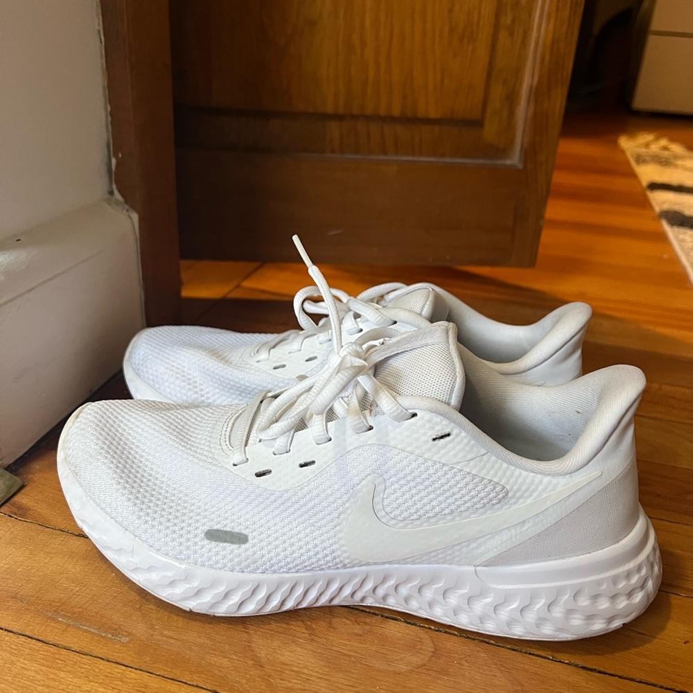 Nike running shoes all white